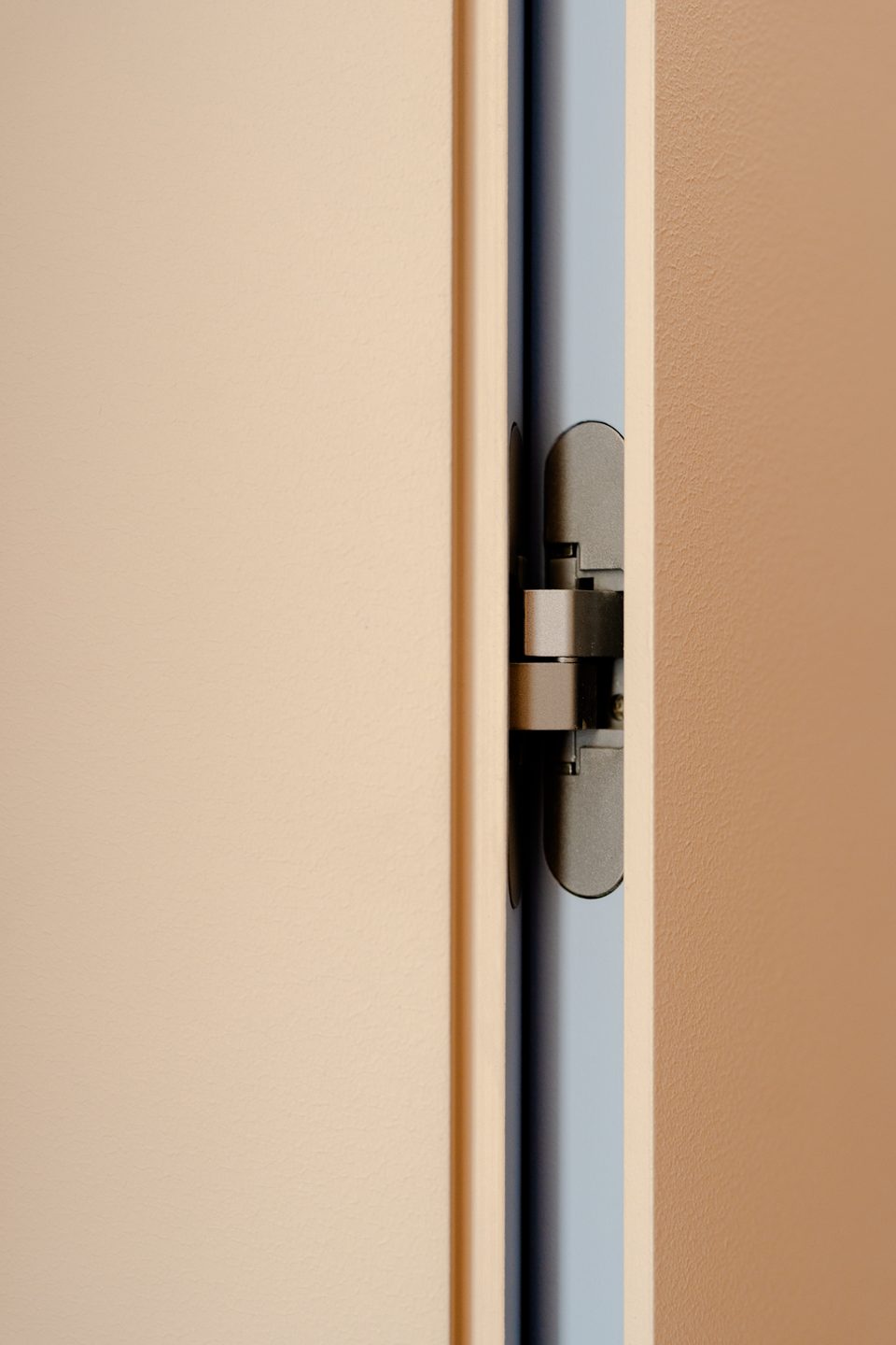 Hidden door hinge